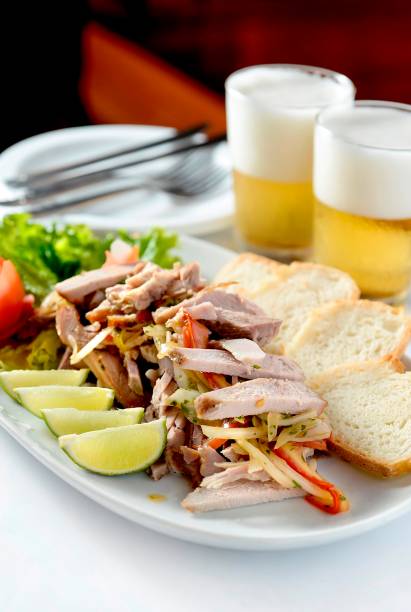 Pernil ao molho de tomate e cebola do bar A Estalagem Pernil ao molho de tomate e cebola do bar A Estalagem