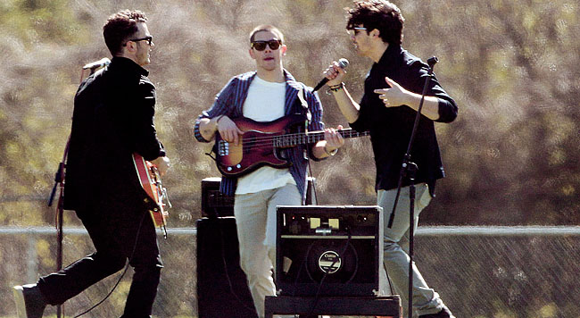 **EXCLUSIVE** Ahead of their Latin American tour, The Jonas Brothers, (Nick, Joe and Kevin Jonas), shoot a music video on a high school football field in Louisiana