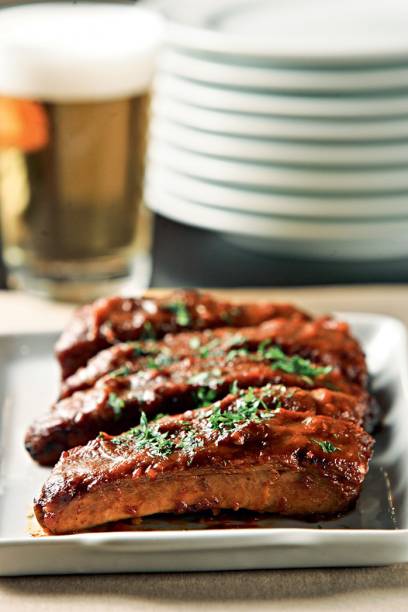 A porção de costelas A porção de costelas