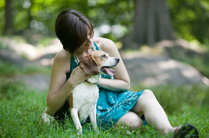 Woman with her pet beagle