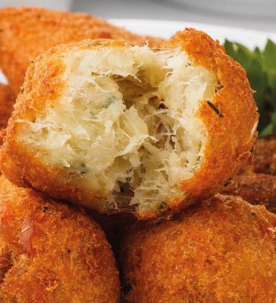 <span>Bolinho de bacalhau da </span><a href="https://preprod.vejasp.abril.com.br/estabelecimento/tasca-do-ze-da-maria/">Tasca do Zé e da Maria</a>