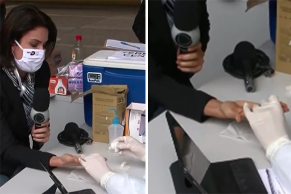 Repórter faz teste para Covid-19 ao vivo e recebe resultado positivo