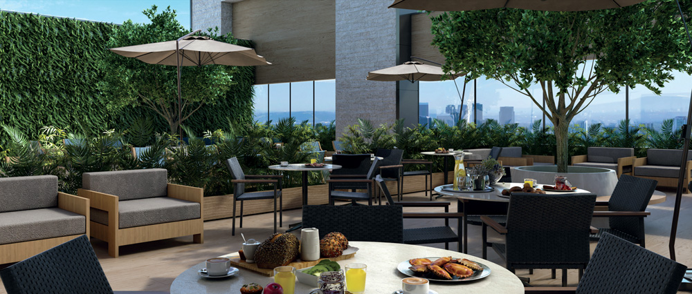 12123 – V5 – Digital – BOOK MATERNIDADE STAR Projeção de um restaurante de luxo com mesa redondas e cadeiras pretas. No amplo salão, há também poltronas na cor bege, vasos de plantas e grandes janelas retangulares no fundo